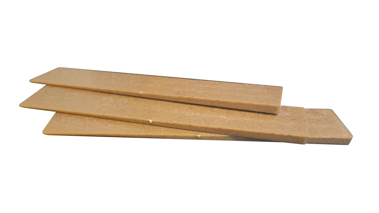 shims, flat side up, wedge end shown